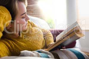 Pretty woman reading a book