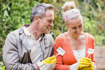 Cute couple doing some gardening