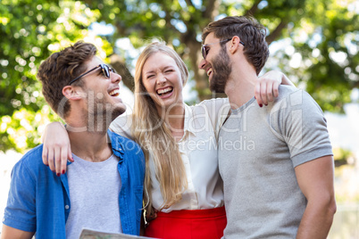 Hip friends laughing together