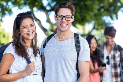 Hip couple posing for camera