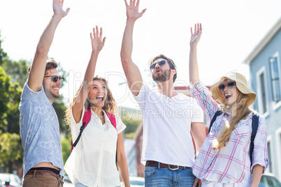 Hip friends raising hands Hip friends raising hands