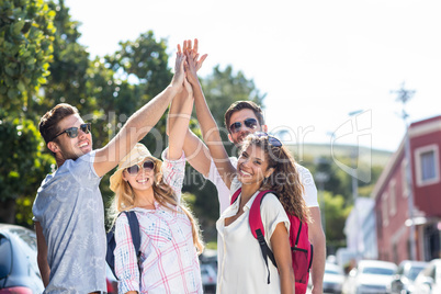 Hip friends doing high-five