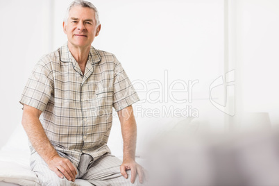 Peaceful senior man smiling