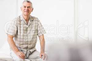 Peaceful senior man smiling