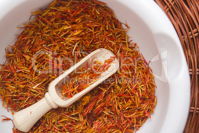 Inflorescence of saffron in a ceramic mortar