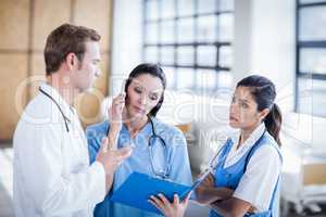 Medical team discussing the report together