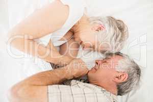 Senior couple in bed sleeping