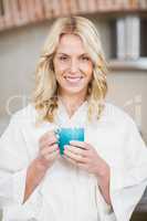 Pretty woman having a cup of coffee