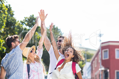 Hip friends doing high-five