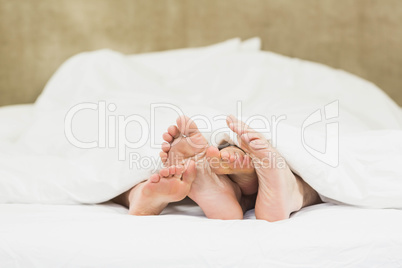 Close up of couples feet