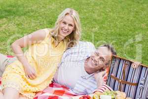 Happy couple having a picnic