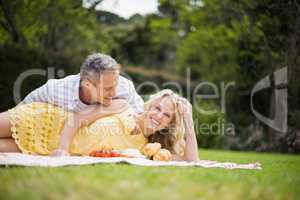 Happy couple having a picnic