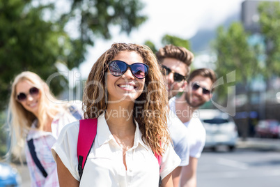 Hip friends walking on the street