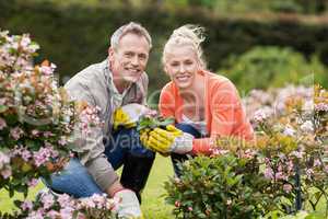 Cute couple looking at flowers