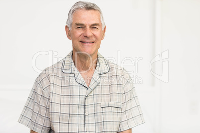 Peaceful senior man smiling