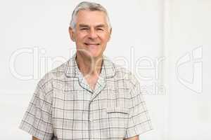 Peaceful senior man smiling