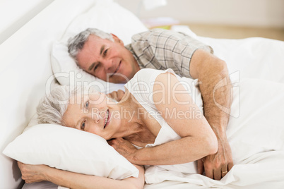 Senior couple in bed