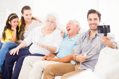 Happy extended family taking selfie