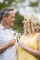 Happy couple drinking champagne