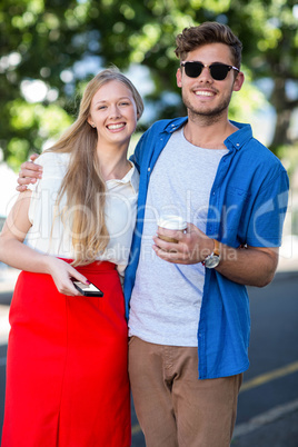 Hip friends smiling at the camera