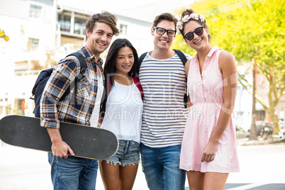 Hip friends smiling at the camera