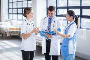 Medical team standing and talking