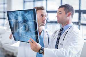 Doctors discussing an xray
