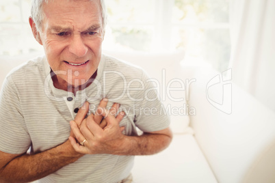 Senior man with pain on heart