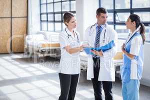 Medical team standing and talking