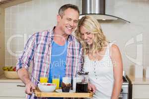 Cute couple preparing breakfast