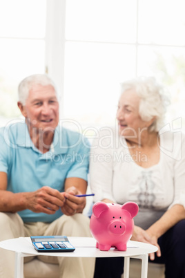 Senior couple saving money