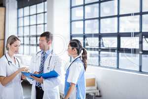 Medical team standing and talking