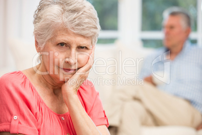 Sad senior woman after arguing with husband