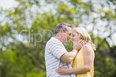 Happy couple about to kiss