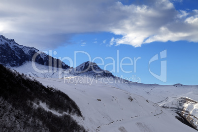 Winter mountains at sun evening