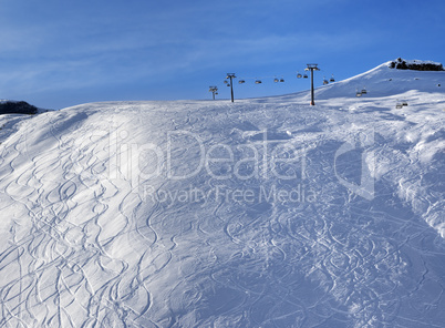 Sunlight off-piste slope at morning