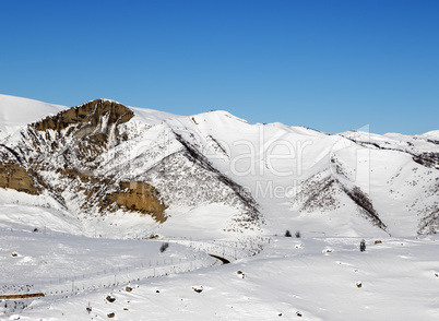 Snowy winter mountains at nice sun morning