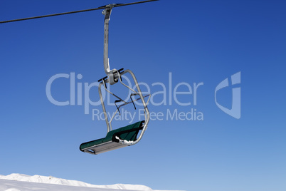 Chair-lift and blue sky