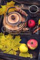 Copper kettle in retro still life