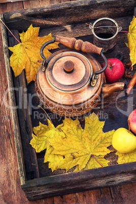 Copper kettle in retro still life