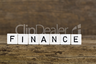 The word finance written in cubes