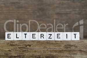 The German word parental leave written in cubes