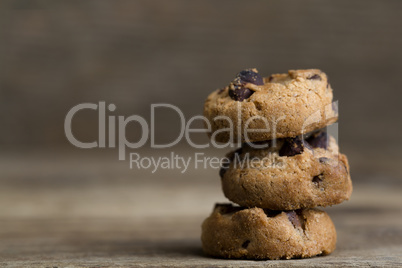 Brown cookies on wooden background