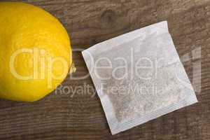 Lemon teabag on wooden background