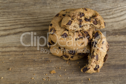 Brown cookies on wooden background