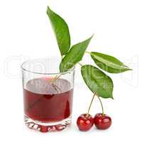 Ripe cherries and juice in glass