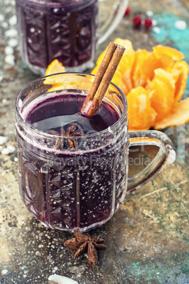 glass of mulled wine and spices