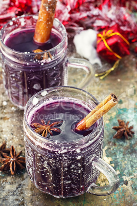 glass of mulled wine and spices