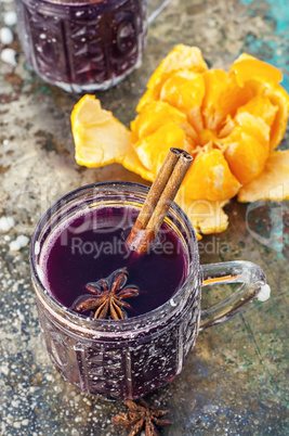 glass of mulled wine and spices