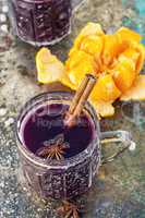 glass of mulled wine and spices